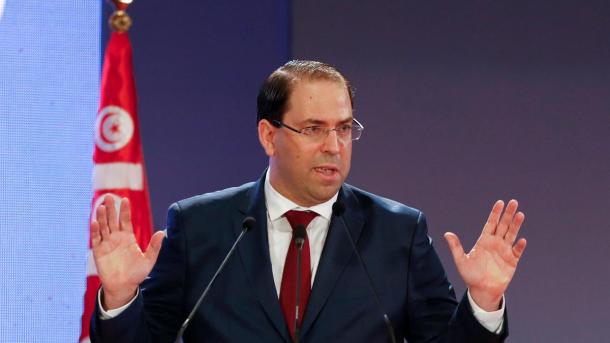 Le premier ministre tunisien, Youssef Chahed, mis à mal par la communauté internationale. (Photo par The National)